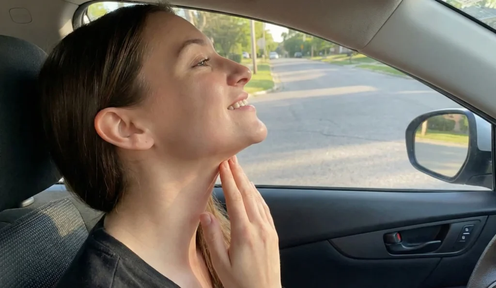 checking sharp jawline side mirror after procedure