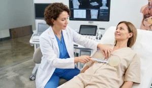 clinical breast exam symmastia pseudo